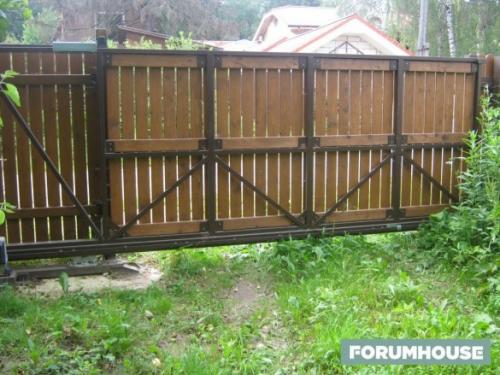 Как самому сделать откатные ворота с калиткой. Откатные ворота: важные лайфхаки