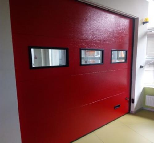 Секционные ворота принцип работы. Принцип работы секционных ворот: