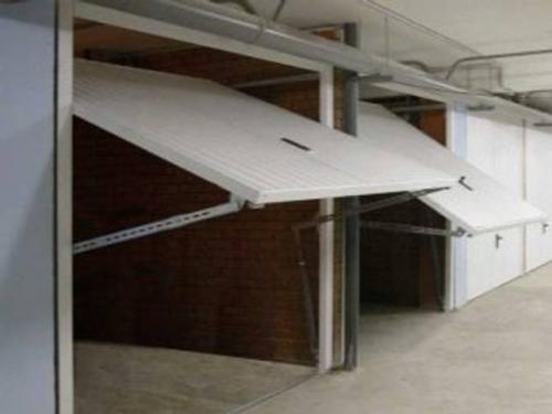 Особенности и принцип конструкции секционных ворот. Виды подъемов ворот 01