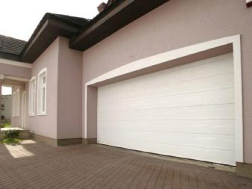 Секционные гаражные ворота с торсионными пружинами. Конструкция секционных ворот 03