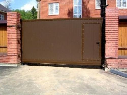 Конструктивные особенности откатных ворот. Ворота откатные своими руками (57 фото): виды, особенности устройства и монтажа 03 Конструктивные особенности откатных ворот. Ворота откатные своими руками (57 фото): виды, особенности устройства и монтажа 03