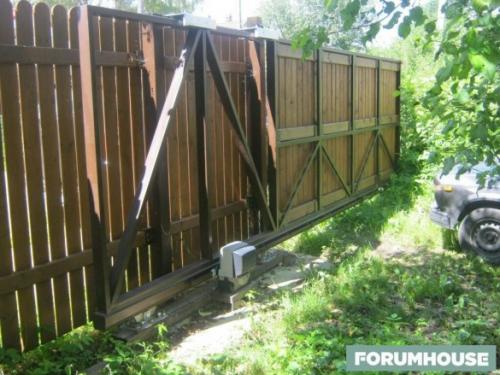 Откатные ворота когда мало места. Откатные ворота: важные лайфхаки